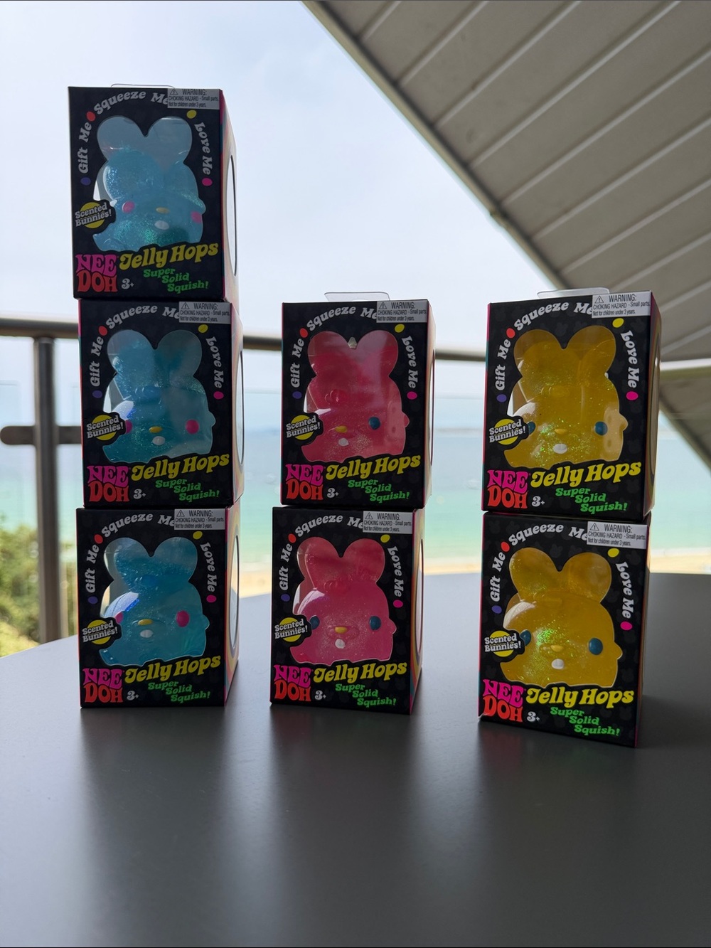 NEE DOH Jelly Hops Squeeze Toy - Blue, Pink, Yellow